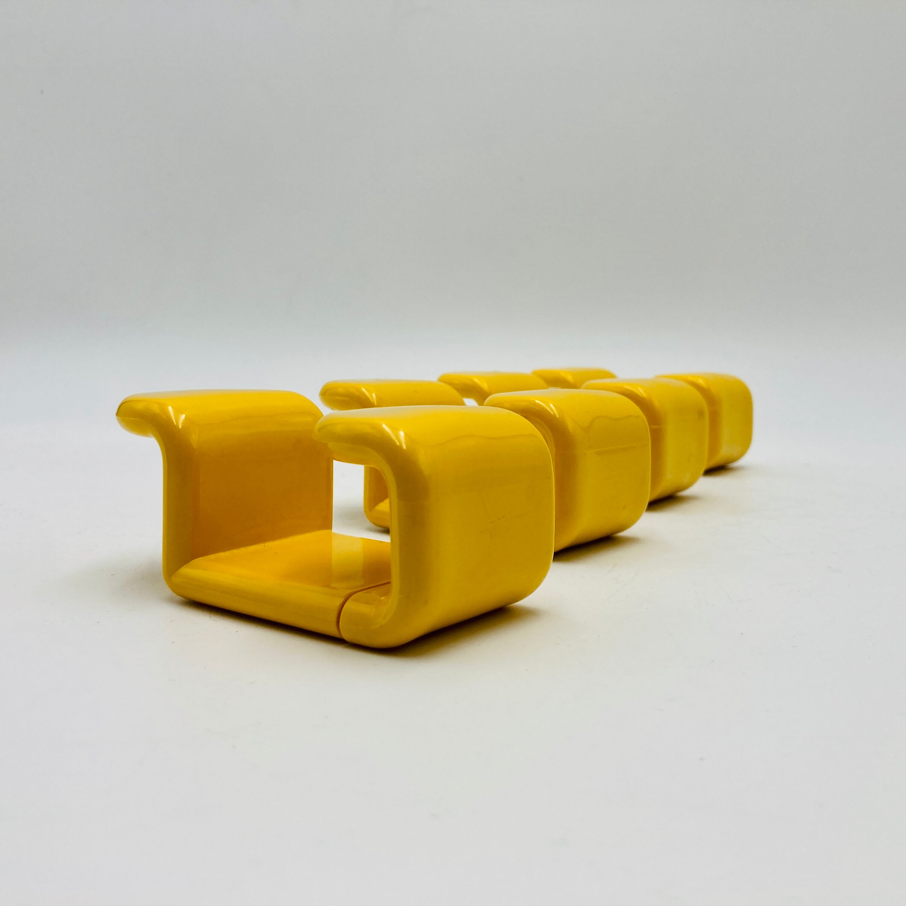 Yellow plastic hooks, design A. Rossari, Gedy edition.