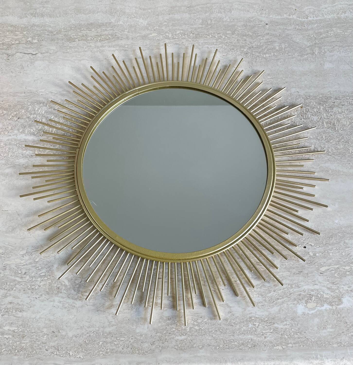 Miroir soleil métal doré
