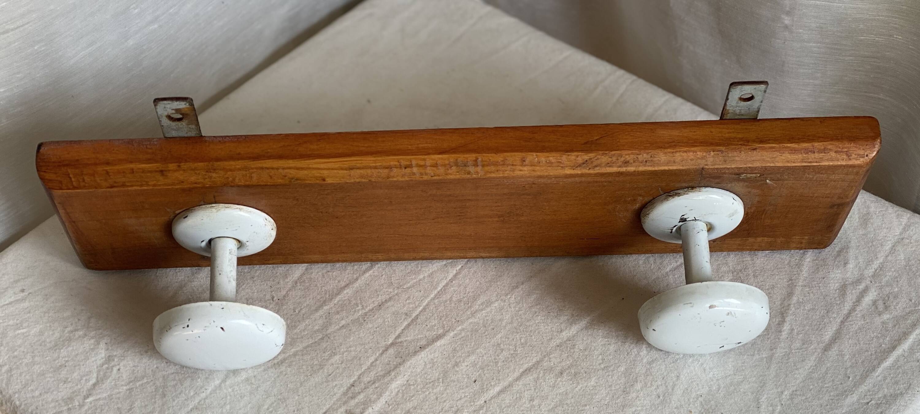 Wall-mounted coat rack with 2 hooks, vintage 1960s white lacquered metal.