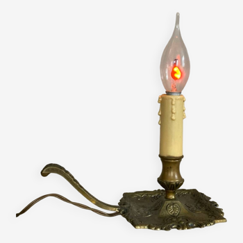 20th century spelter candle holder mounted as a flame bulb lamp