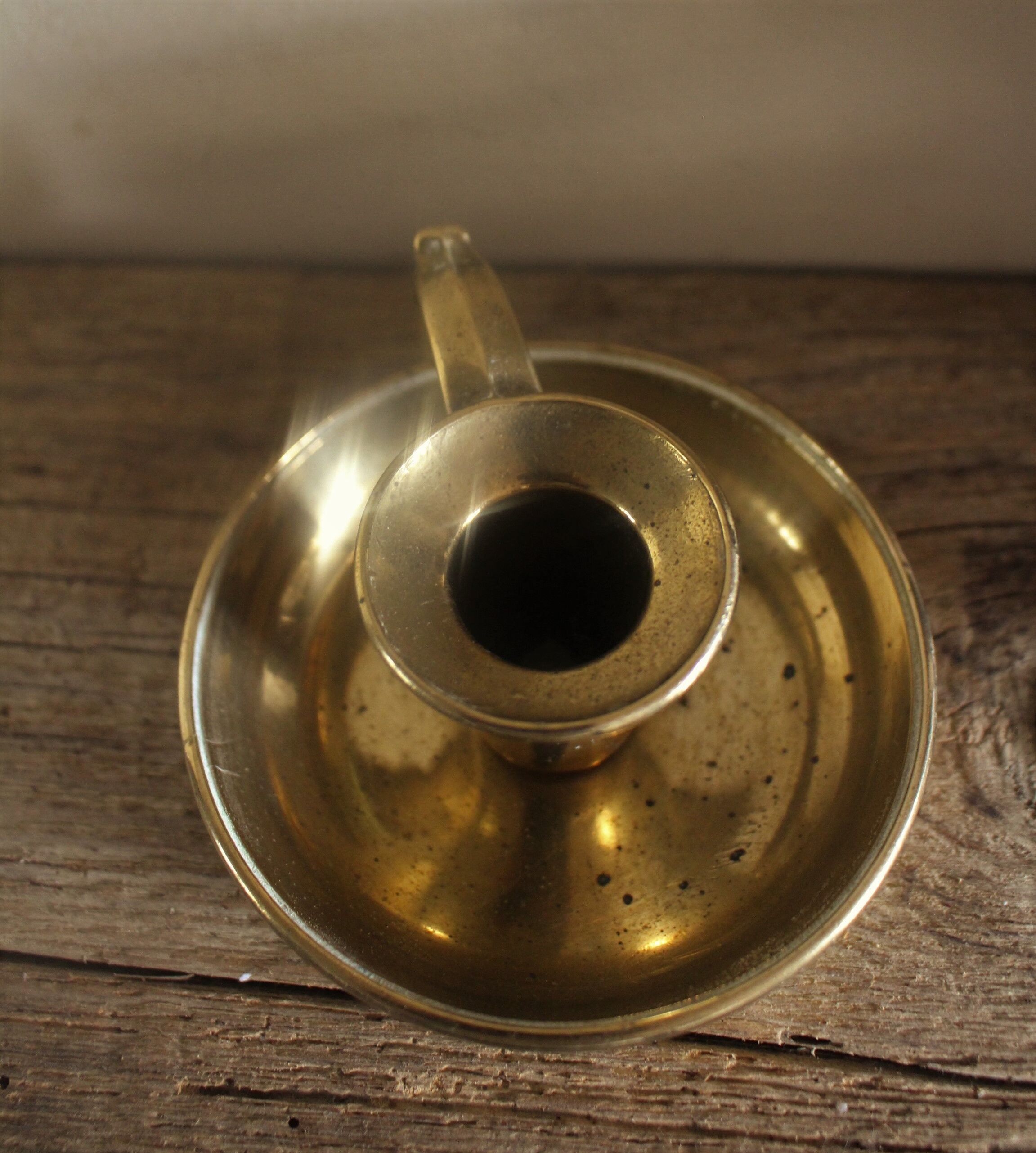 Cave rat brass candle holder