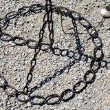 Vintage floor lamp from the 50s in blackened iron in the shape of a chain