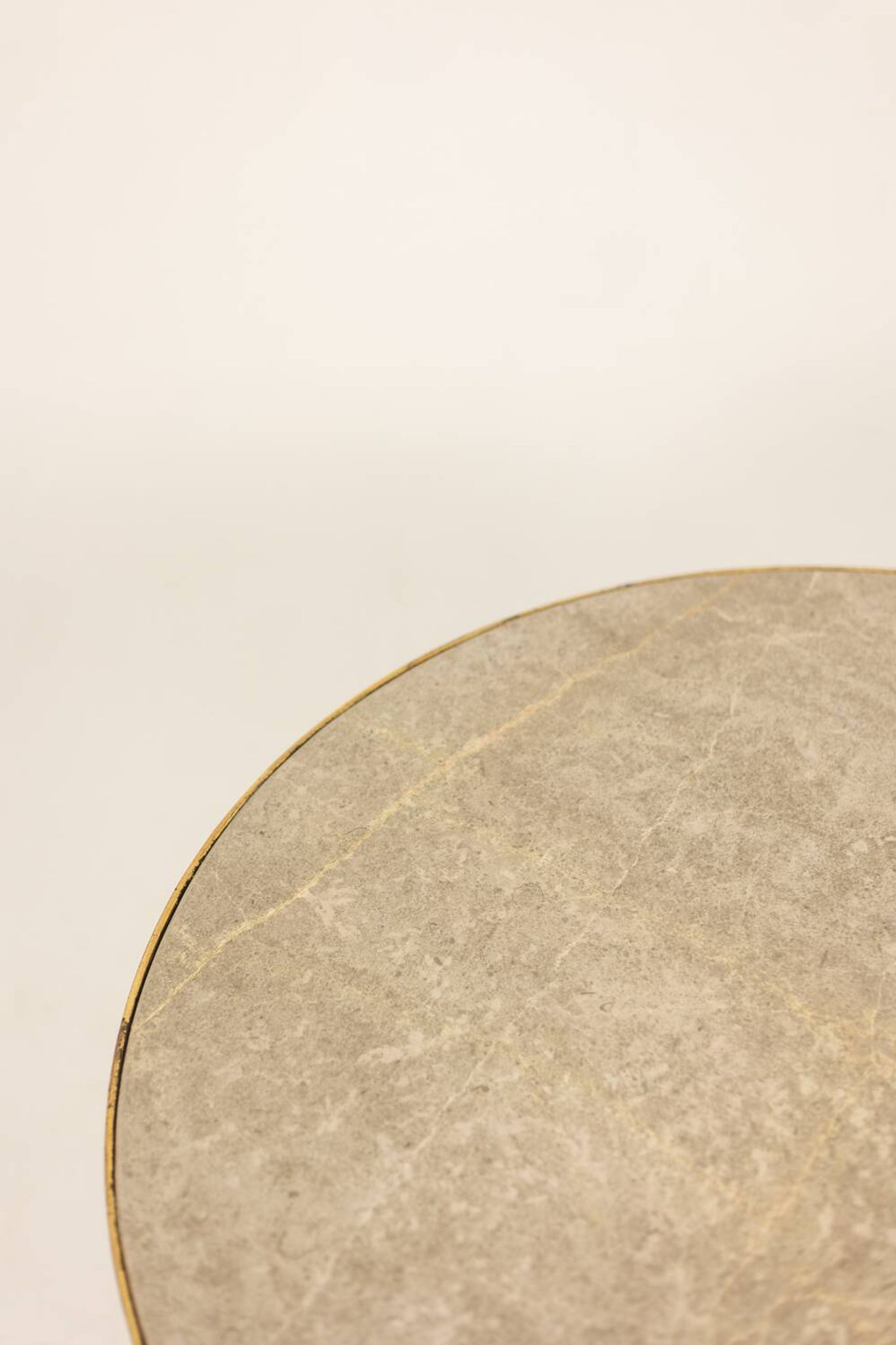 Golden metal side table with a grey marble top, 20th century.