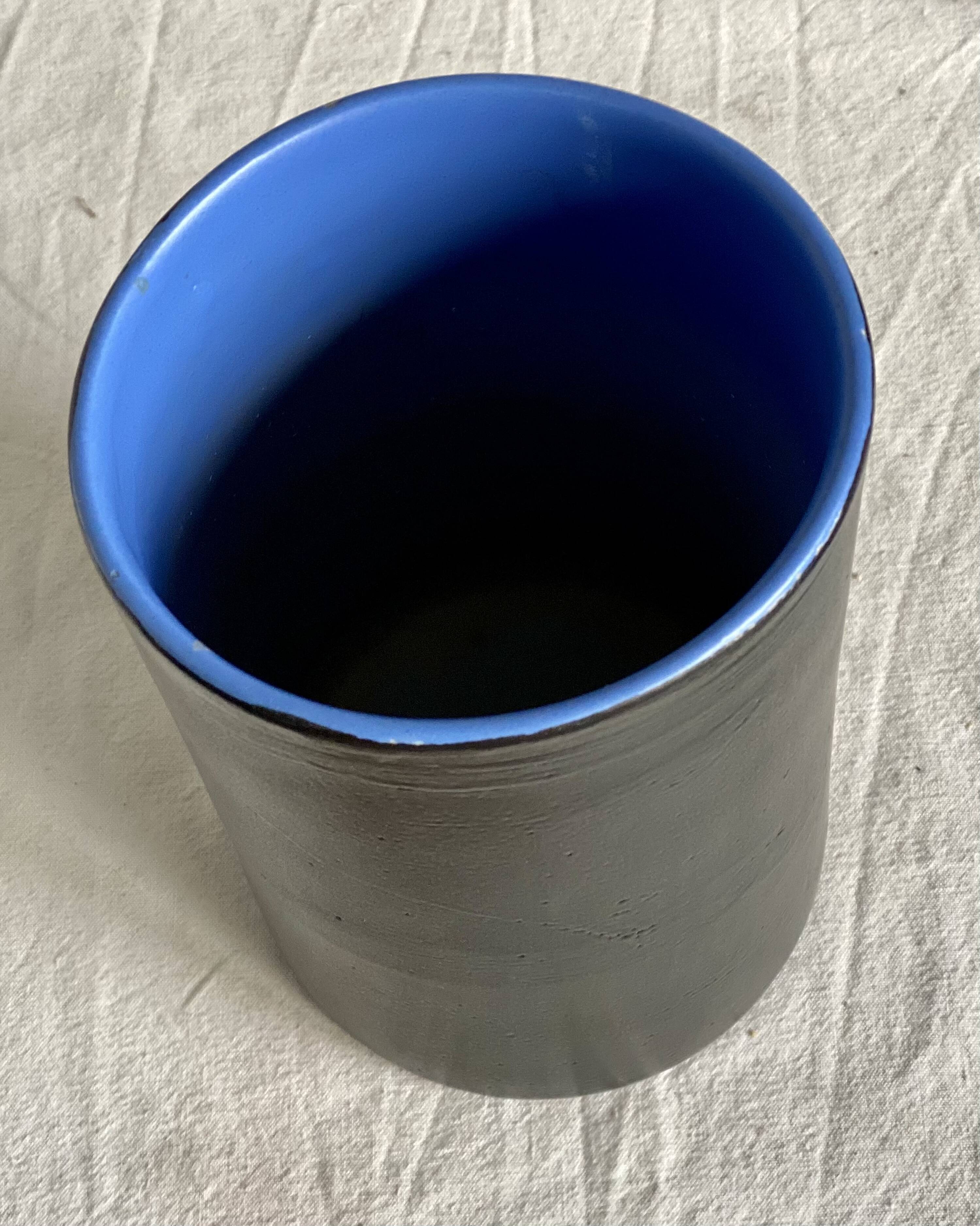 Vintage 1970s black ceramic roll vase signed Dumez.