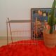 Pedestal table, door magazines in gilded metal years 50 - 60