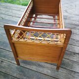 Wooden and rattan child bed