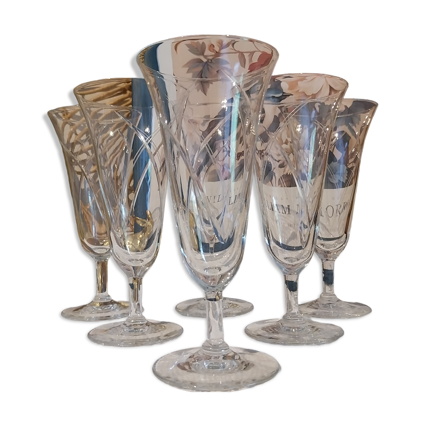 Old engraved crystal champagne flutes