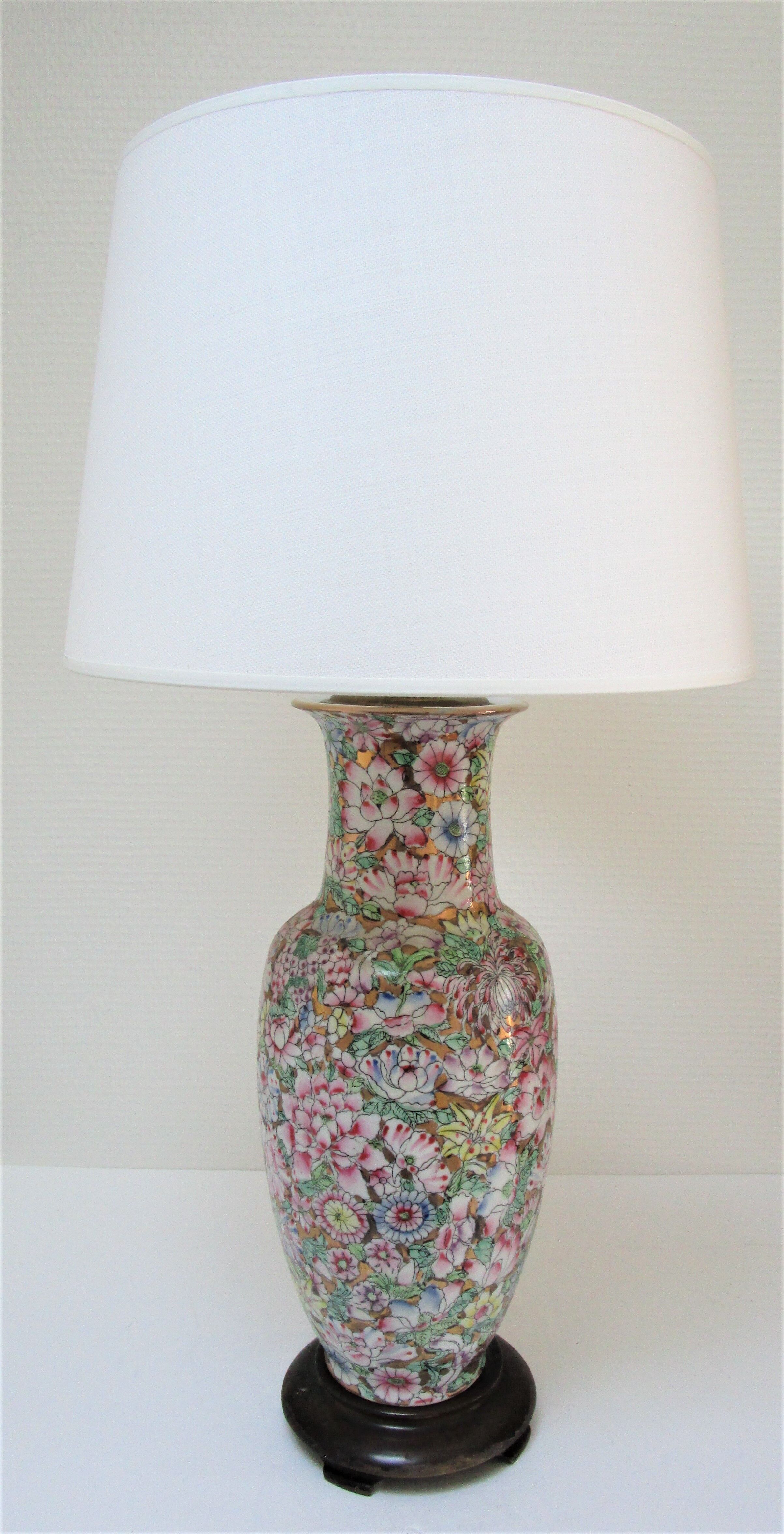 Chinese porcelain lamp foot with polychrome decoration of vintage flowers