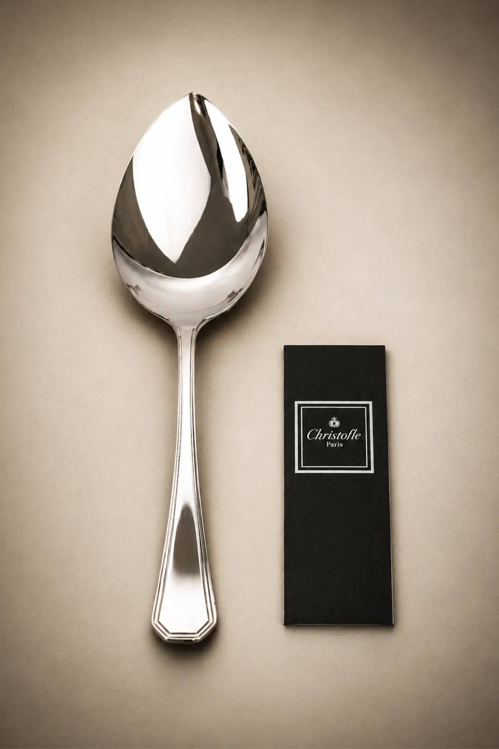Serving spoon Christofle model America in silver-plated metal, design by Luc Lanel.