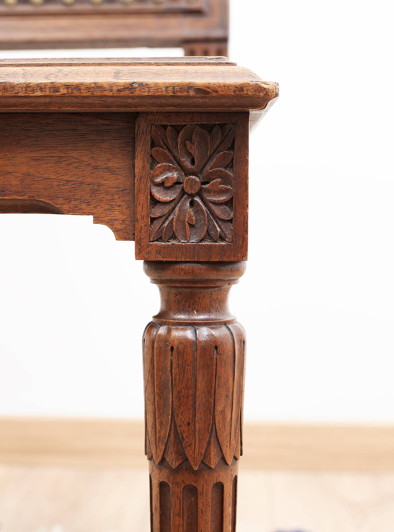 Set of 4 Louis XVI style chairs in carved wood and embossed leather.