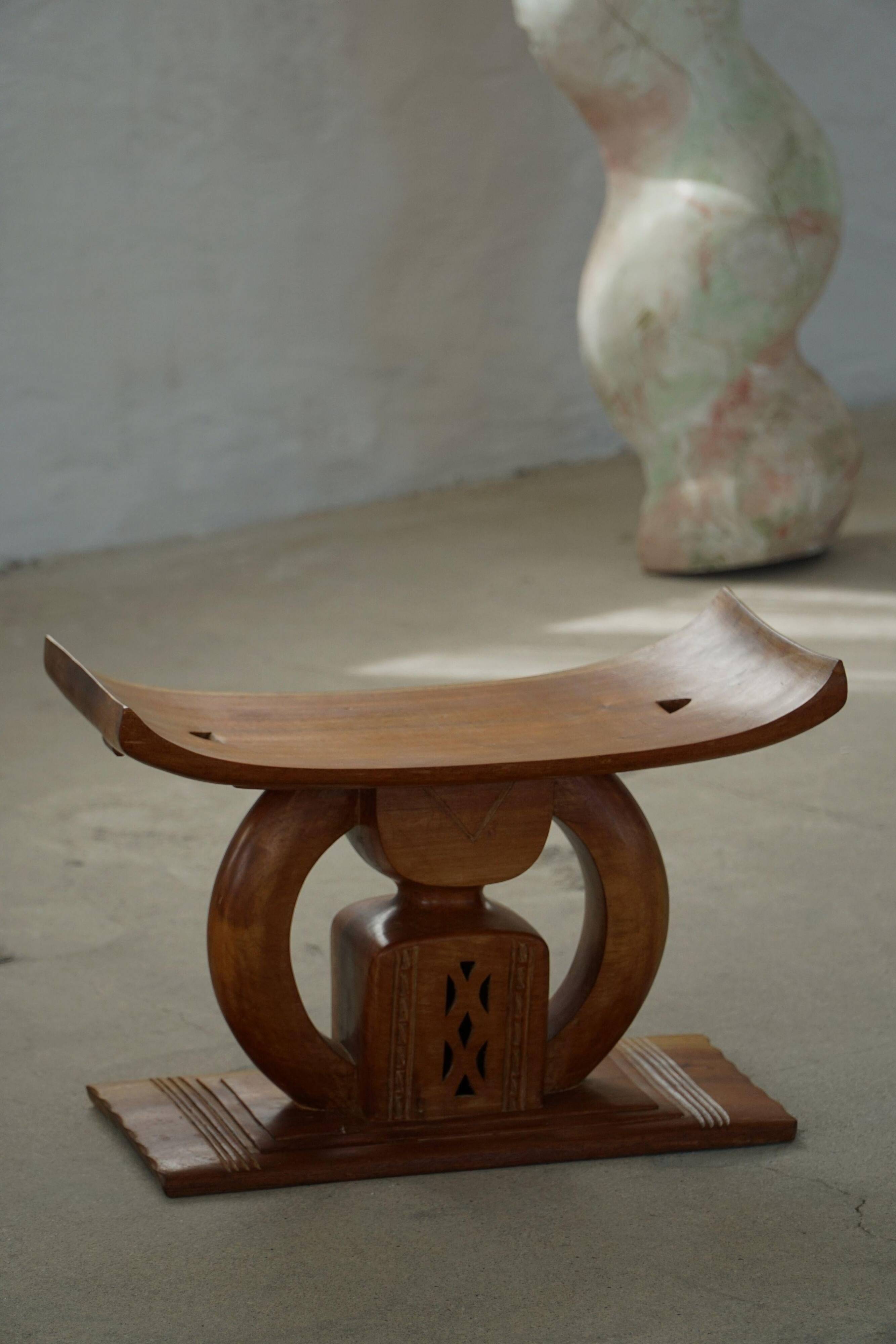 Ashanti stool from West Africa, carved from hardwood, 20th century.