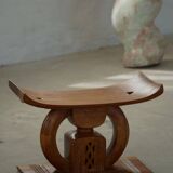 Ashanti stool from West Africa, carved from hardwood, 20th century.