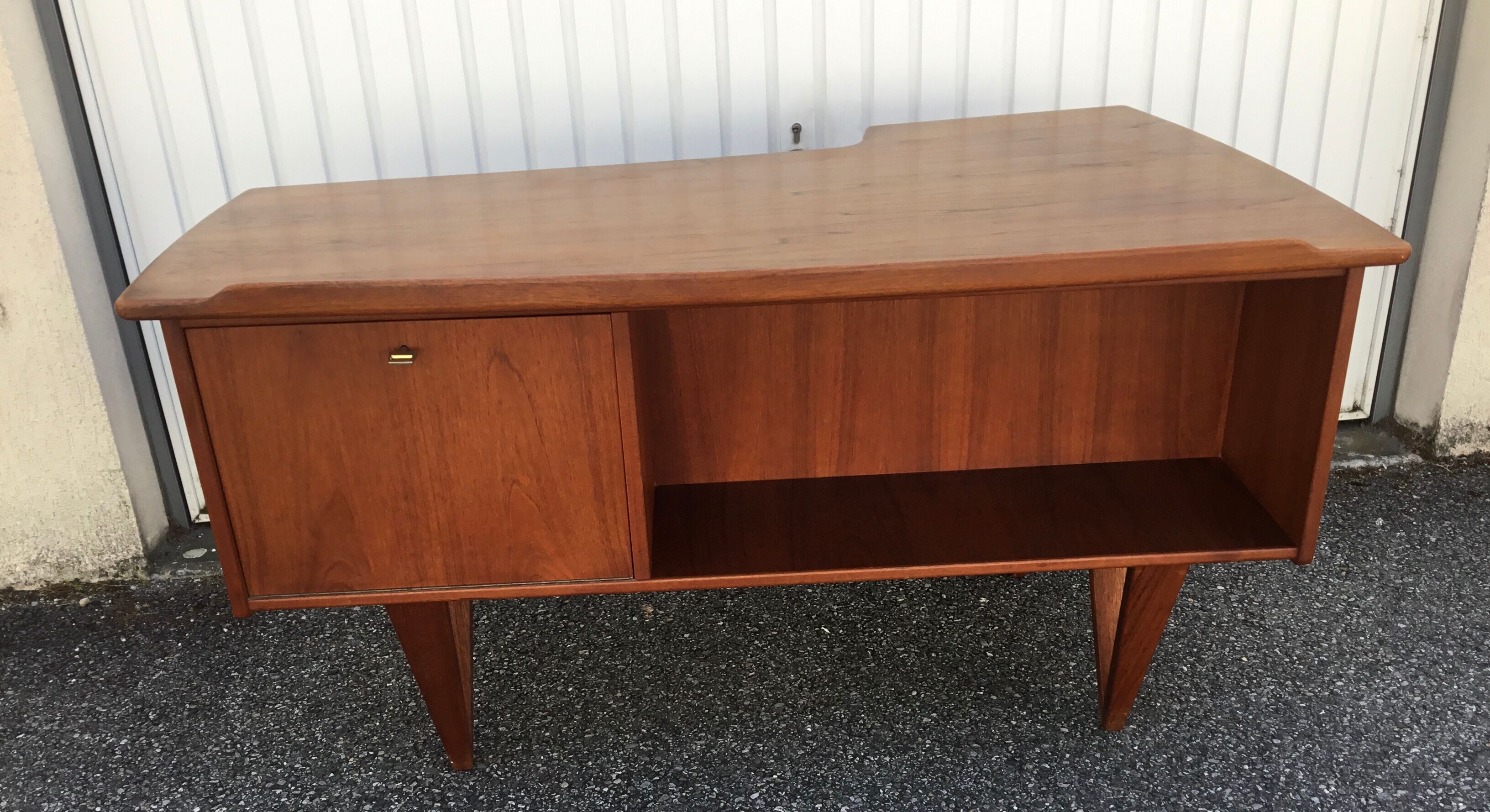 Peter Lovig Nielsen's Scandinavian teak boomerang desk from the 60s