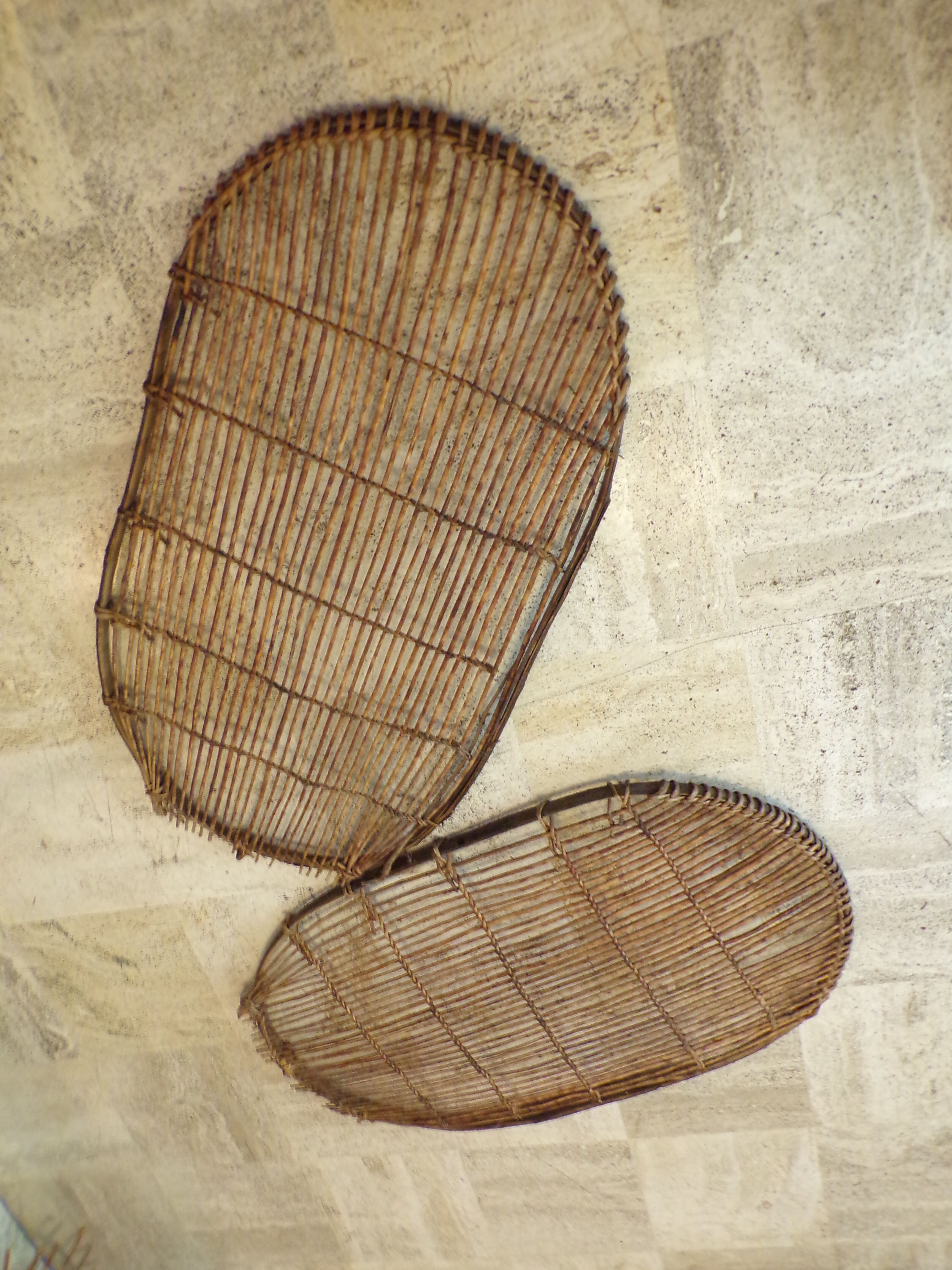 Duo of old wicker racks