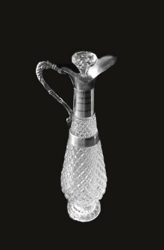 Diamond-point molded glass ewer, silver-plated metal.