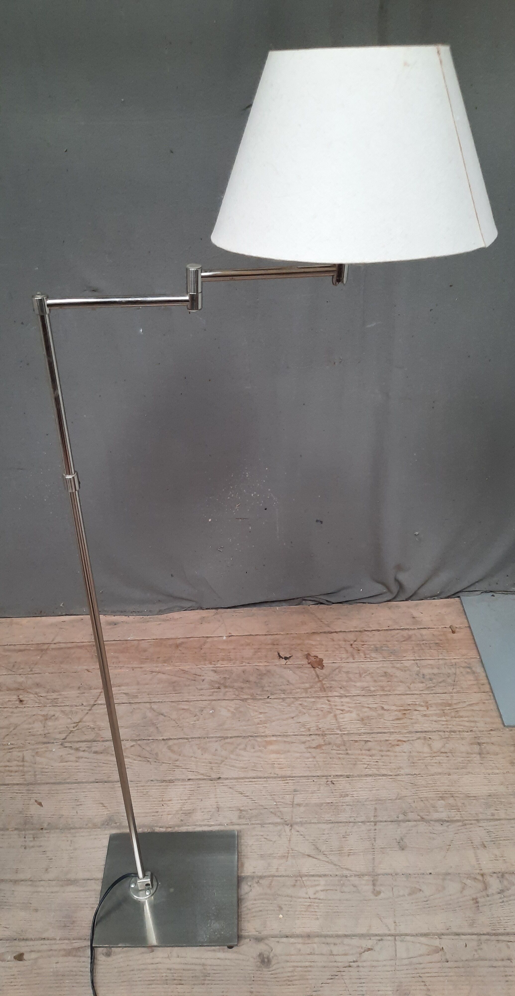 Brushed steel standing lamp