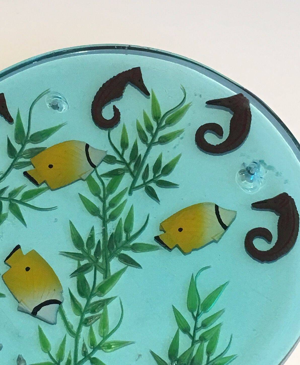 Set of 4 resin trays, inlaid with seahorses, fish, seaweed, and shells.