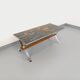 Vintage coffee table from the 60s and 70s in ceramic, chrome metal, and wood.