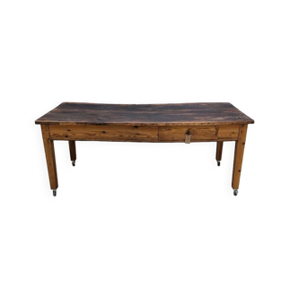 Farm table mounted on casters
