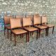 8 chaises scandinaves années 1960 de johannes andersen en palissandre massi