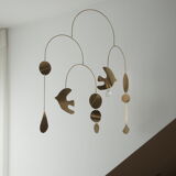 Mobile model Rana . Mobile in abstract brass.