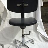 Adjustable swivel desk chair with 70's wheels