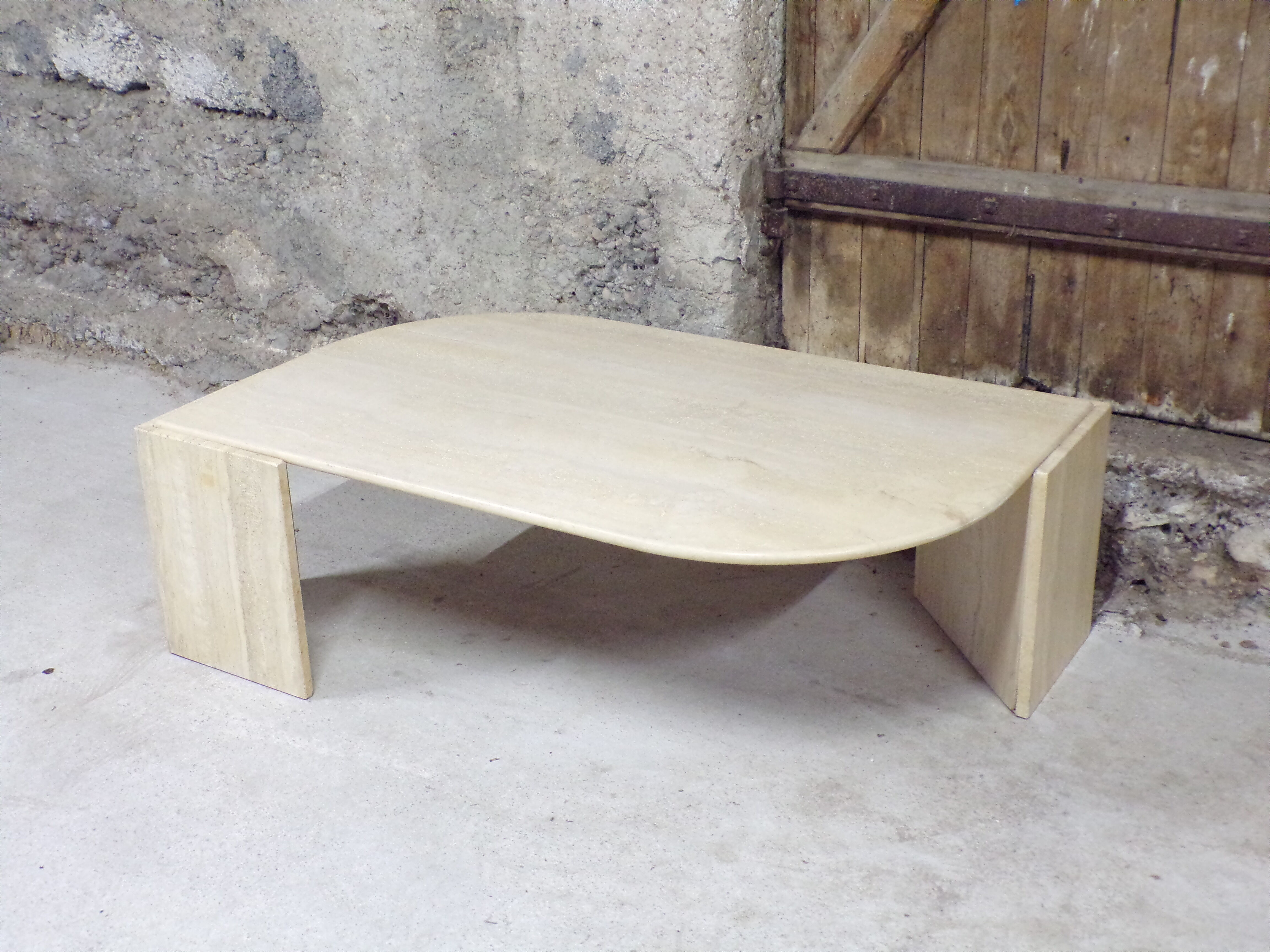 Table basse oeil en travertin 77X127 cm