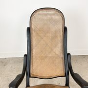 Antique black bentwood and cane lounge armchair by Thonet 19th century