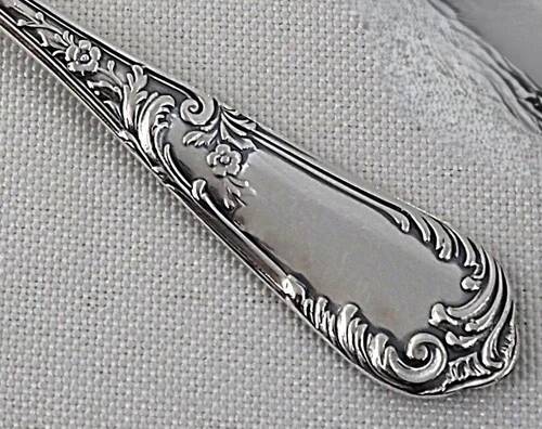 Ercuis Louis XV floral, 12 fish cutlery sets, 24 pieces in silver-plated metal.