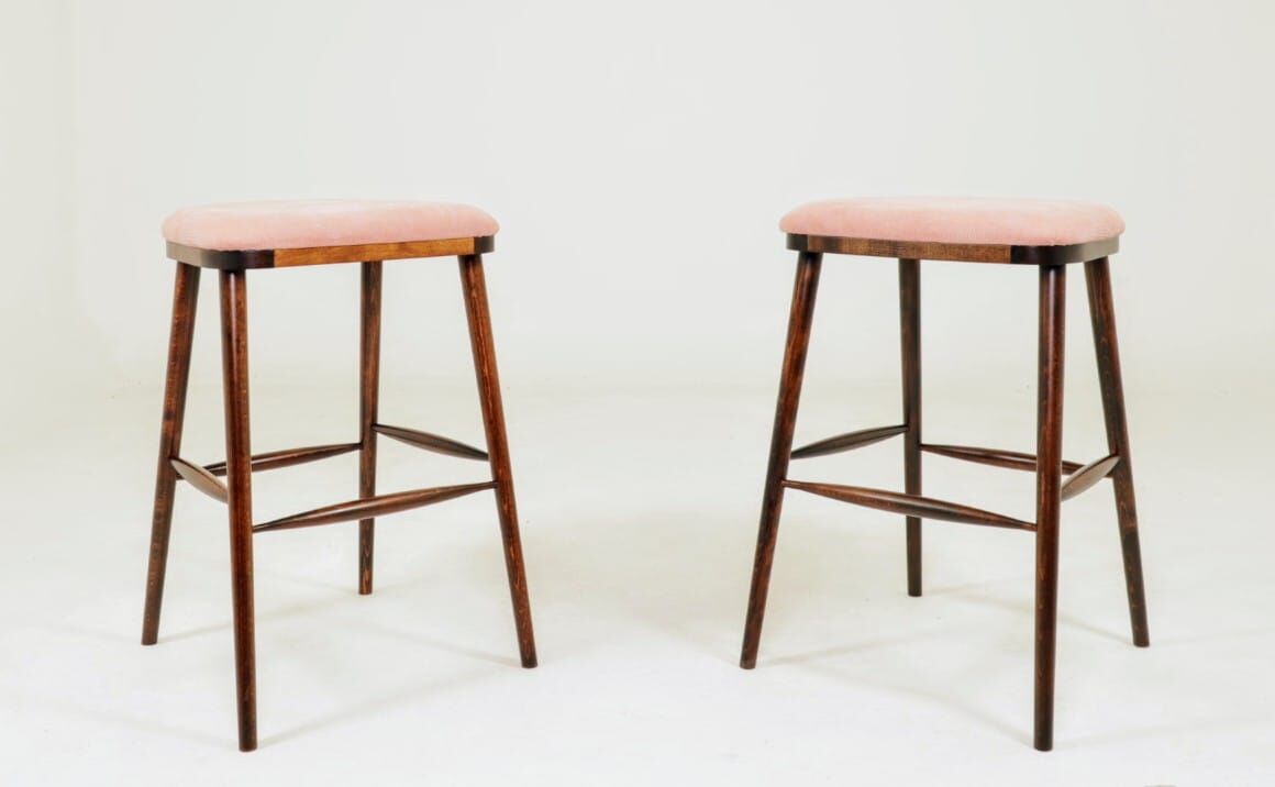Bar stools matching the vintage style, in pink corduroy.