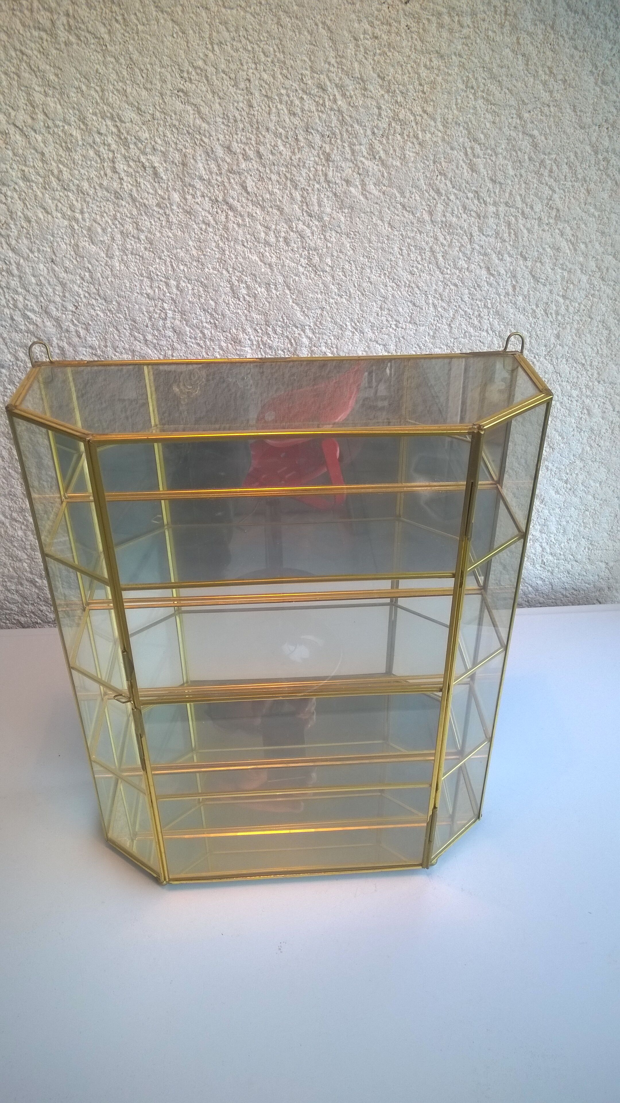 Laiton and glass window