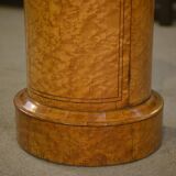 Empire gueridon in mottled maple with a blue stone top, 19th century.