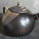 Vintage enameled stoneware potter's teapot