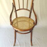 Small canned armchair; in curved wood, bistro, 1890