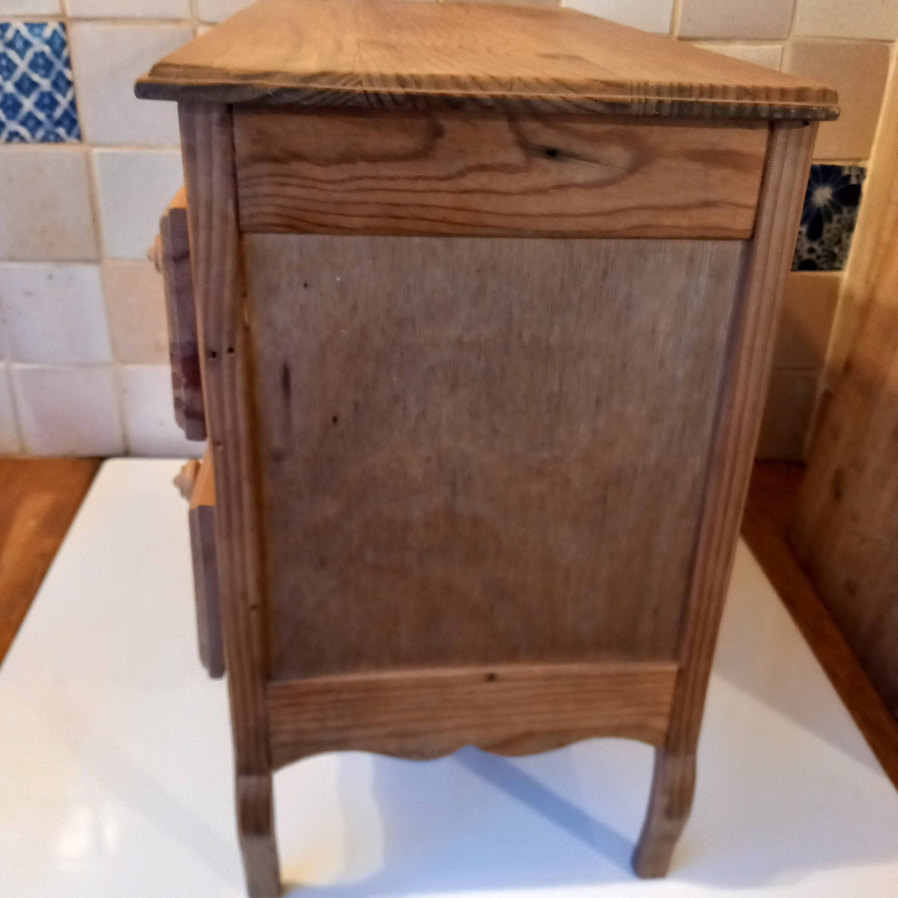 Small wooden chest of drawers