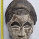 Masque Igbo en bois sculpté, grande coiffe, patine bicolore, Nigeria, 33 cm