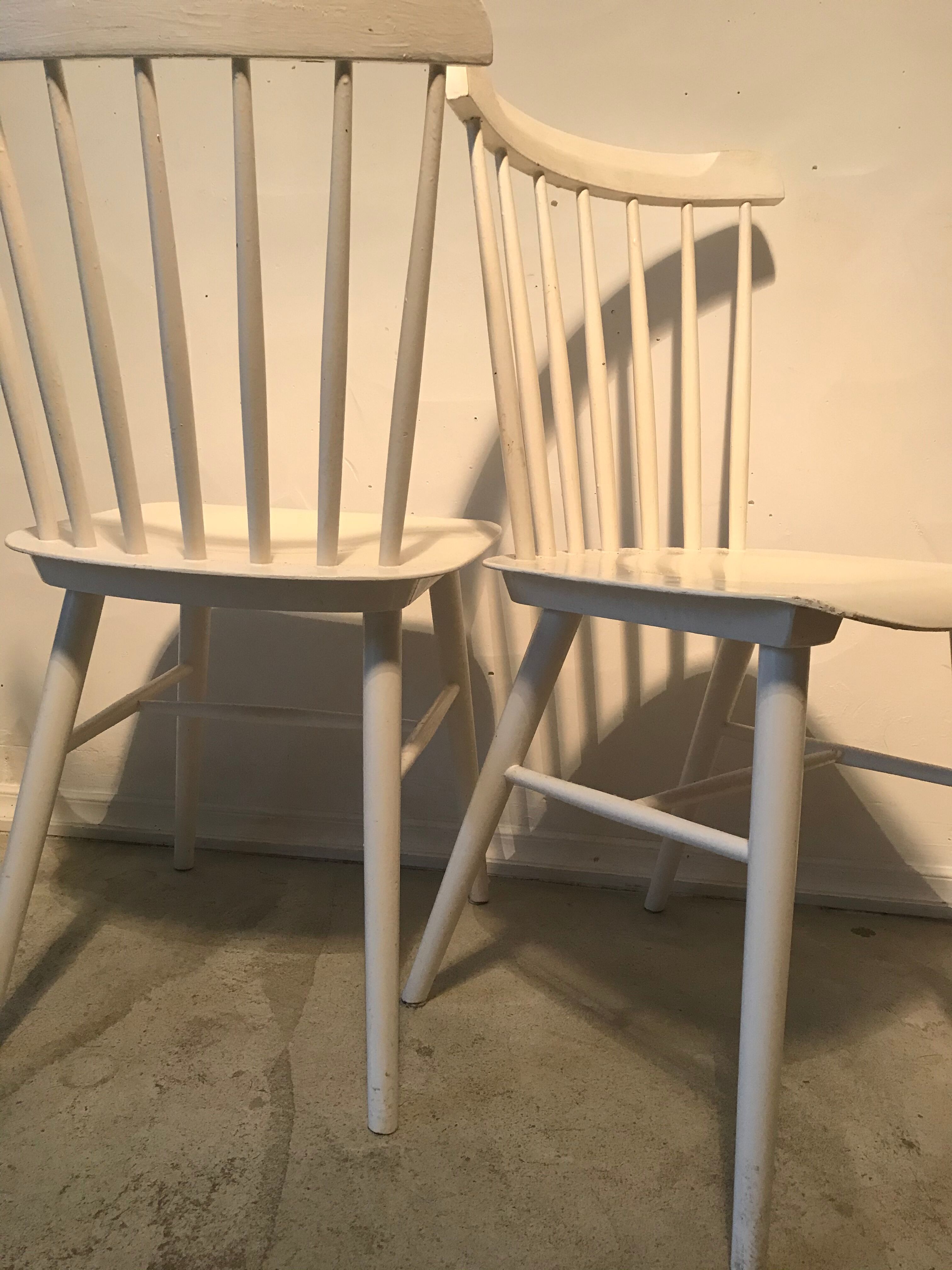 Pair of vintage chairs with compass footings
