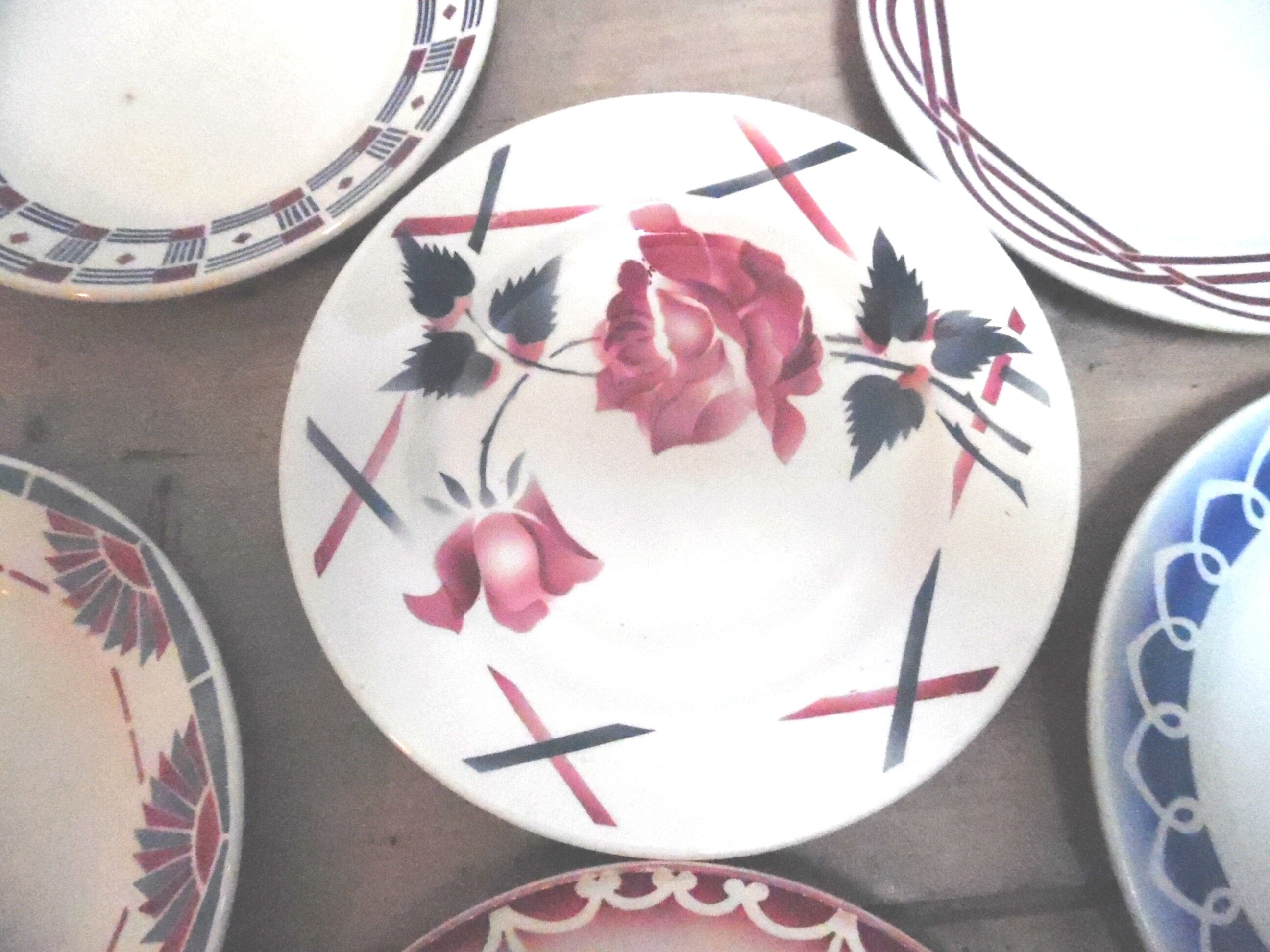 Six plates mismatched earthenware