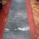 White veined black marble fireplace