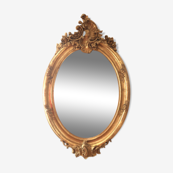 Miroir ovale en bois doré 98x63 cm