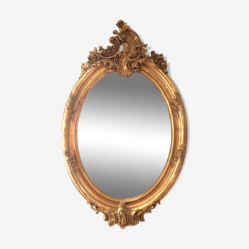 Oval mirror in gilded wood 98x63 cm