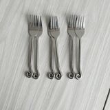 6 shiny metal cutlery sets
