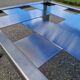 Stainless steel and smoked glass coffee table