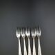 5 Small vintage metal silver forks