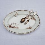 Large oval serving dish in Creil and Montereau earthenware Model Marine, iron earth