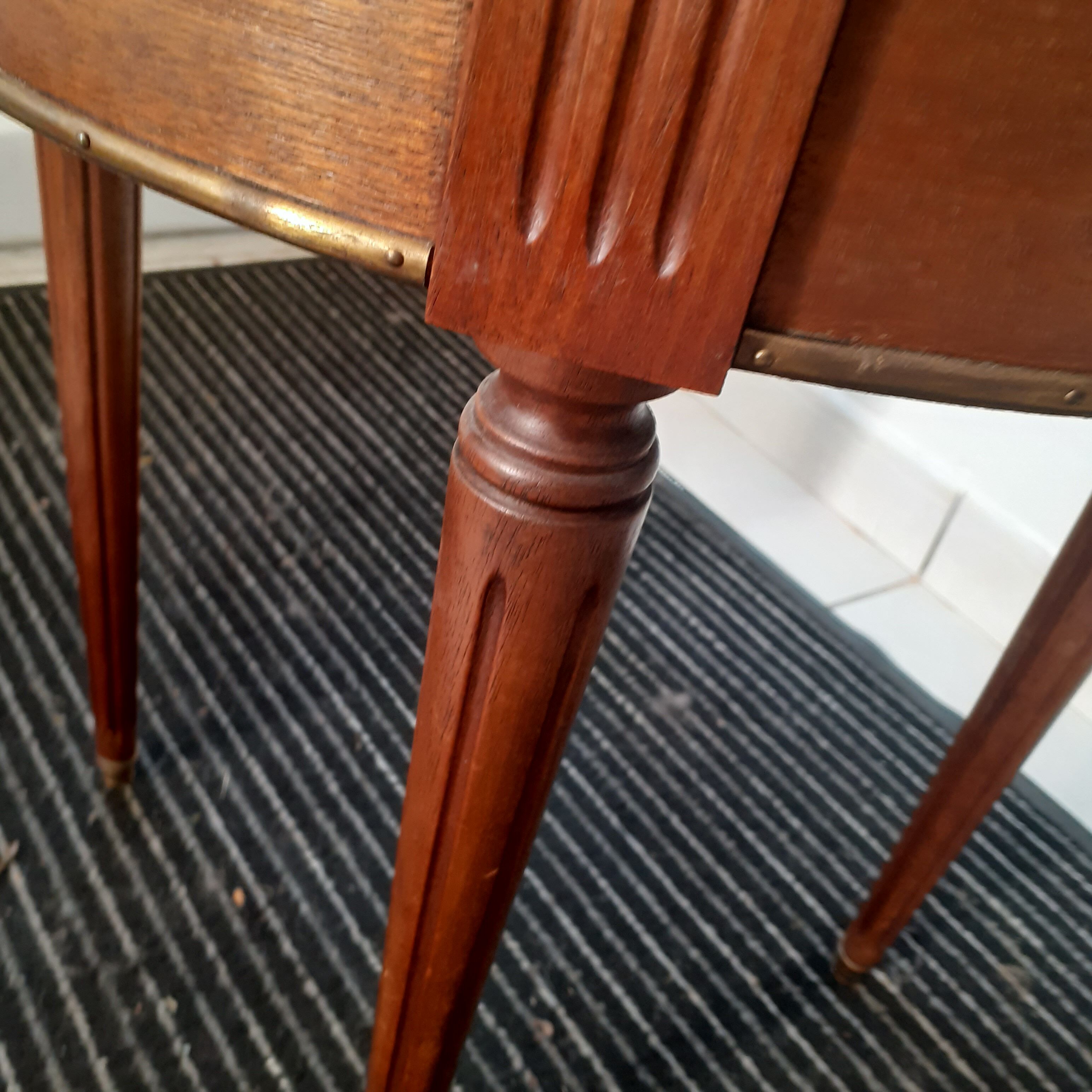 Round cherry guerion with white marble top