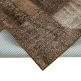 Handwoven oriental vintage 170 cm x 241 cm brown patchwork carpet