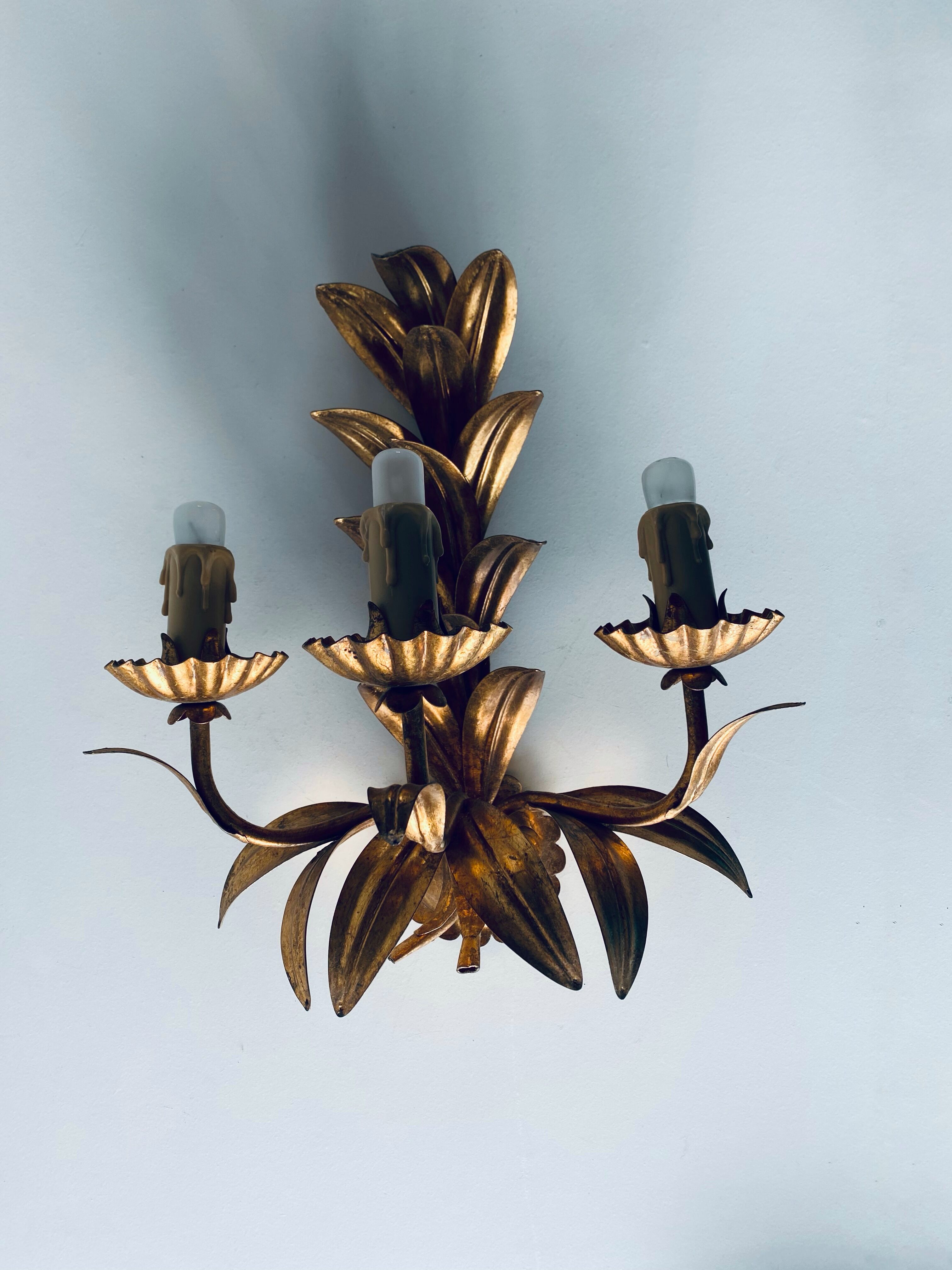 Golden leaf wall light