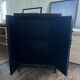 Small Chinese cabinet in black lacquer.
