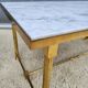 Hollywood Regency style coffee table • marble and brass